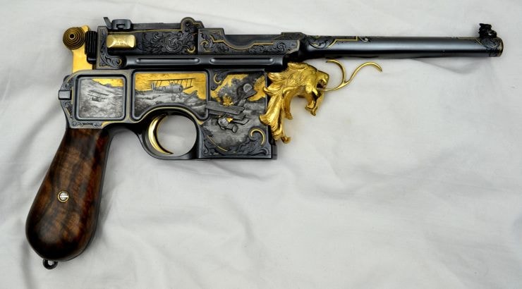 Mauser C96 — full scroll engraving with gold lion and WWI biplane scene