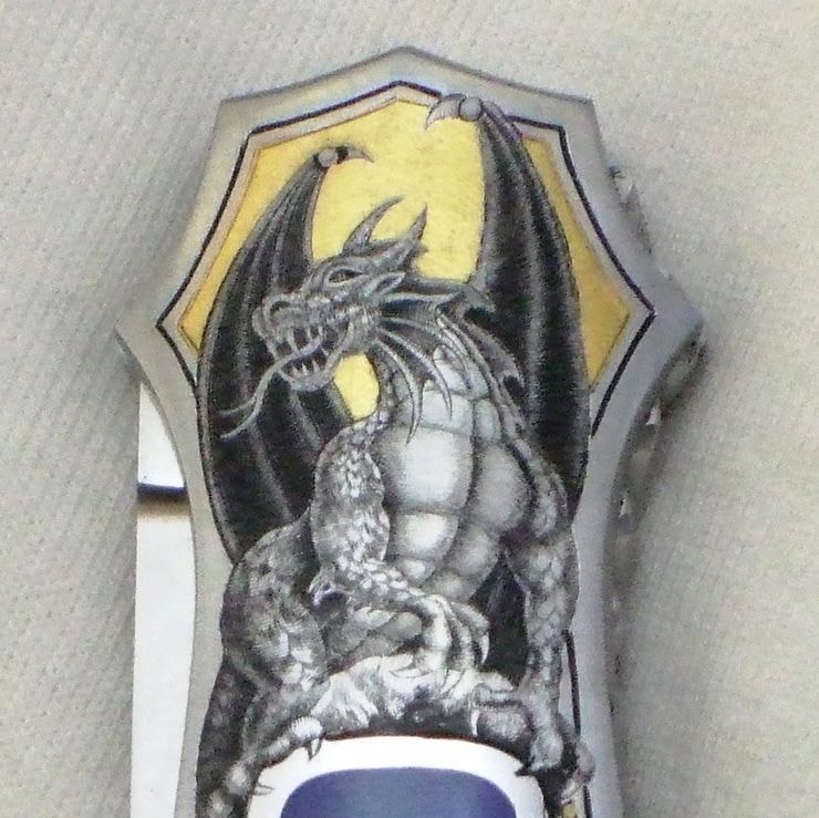Knife bolster — dragon engraving, gold shield, wider view